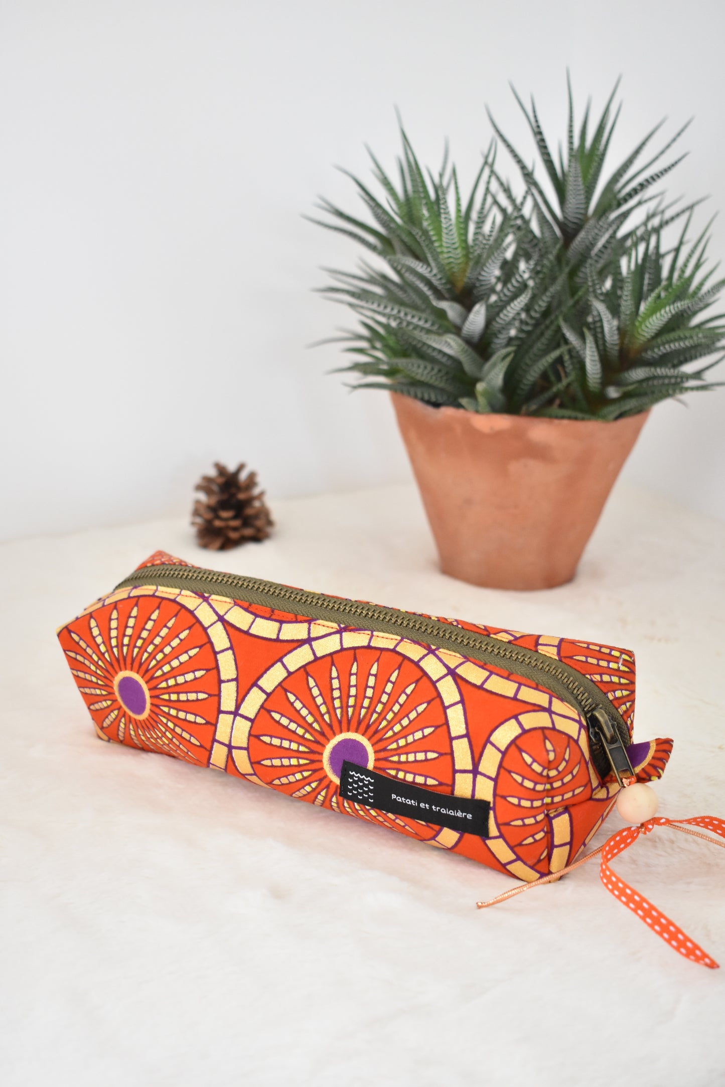 Wax orange trousse