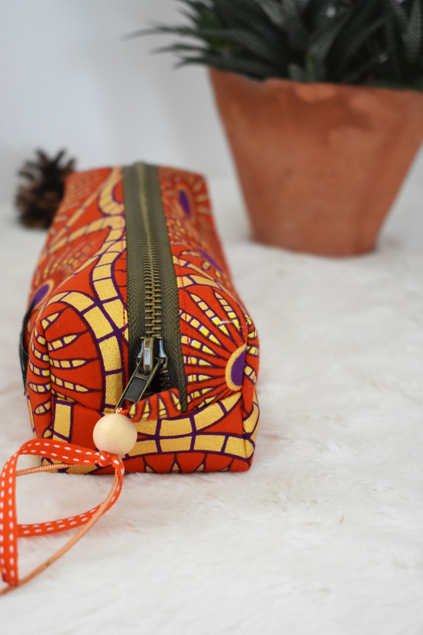 Wax orange trousse